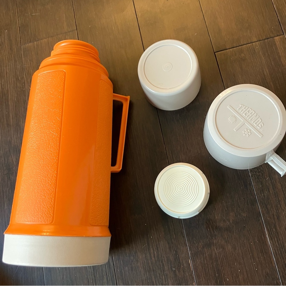 Thermos Orange and Cream Insulated Beverage Container.  Great vintage condition